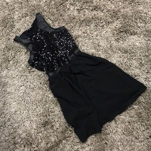 Little black dress with sequin, faux leather
